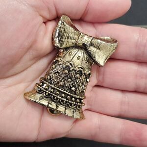 Vintage gold tone bell brooch